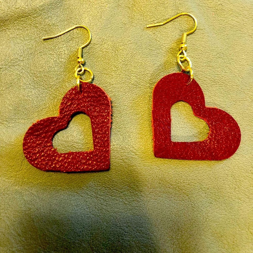 Red leather heart earrings.